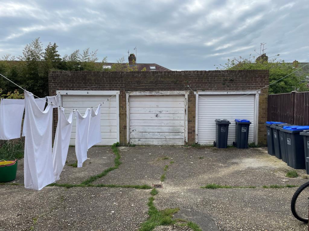 Lot: 9 - FREEHOLD GROUND RENTS - view of three garages and driveway